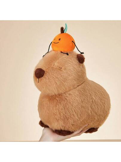 Peluche Capybara Naranja en la cabeza