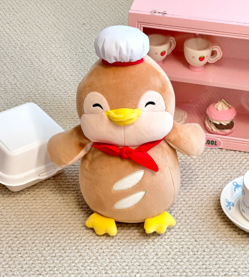 Peluche de pingüino chef